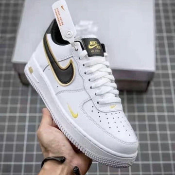 Zapatillas Nike Air Force LV8 - Blanco y negro con detalles dorados